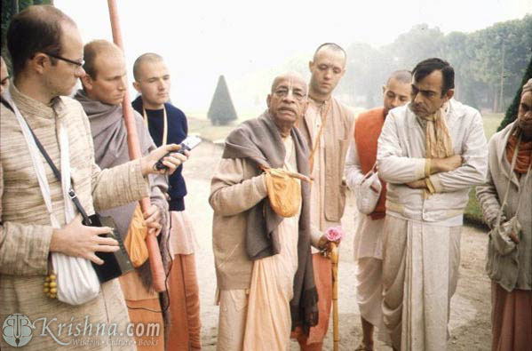 Srila Prabhupada with disciples in a morning walk in Paris.