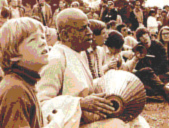 Srila Prabhupada chanting Hare Krihsna in Thompkins Square Park, New York City.