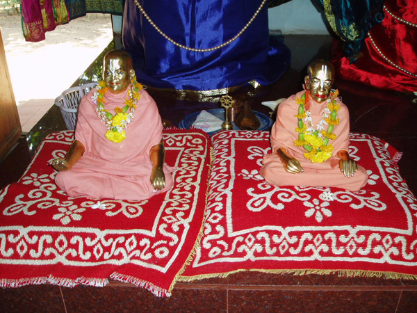 The small brass deities of Srila Prabhupada and Srila Gour Govinda Swami Maharaja.